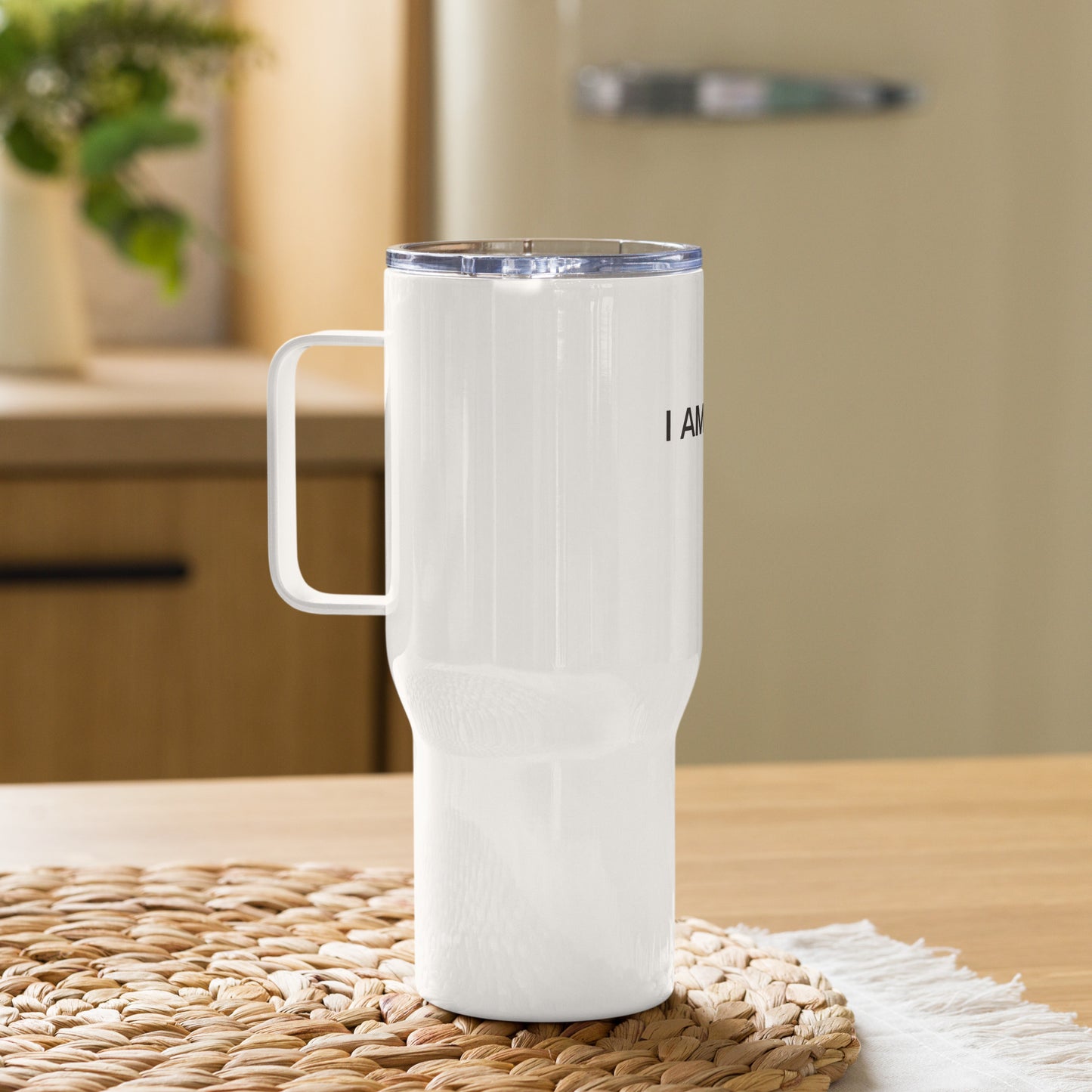 Travel mug with a handle